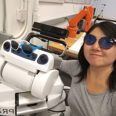 photo of alyssa kubota with a robot